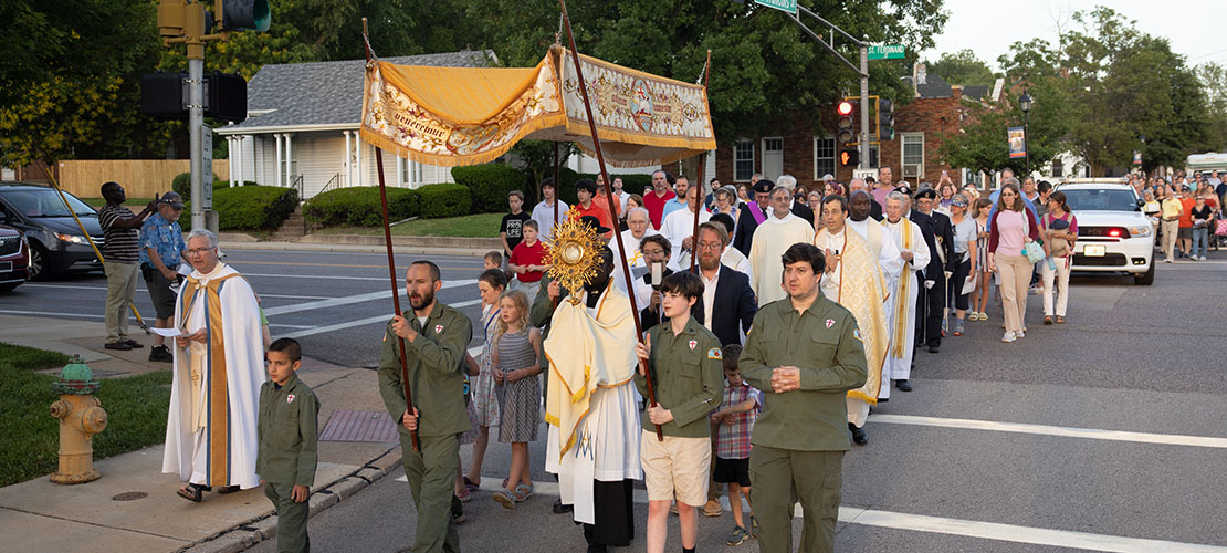 North County parishes bring Jesus to the streets as part of annual Corpus Christi procession in Old Town Florissant