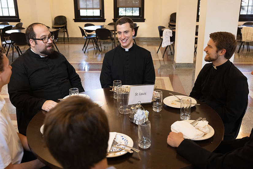 Then-seminarians Robert Lawson, Joseph Martin and Jeffrey Fennewald gathered with other seminarians from the Archdiocese of St. Louis for dinner in 2023 at Kenrick-Glennon Seminary in Shrewsbury.